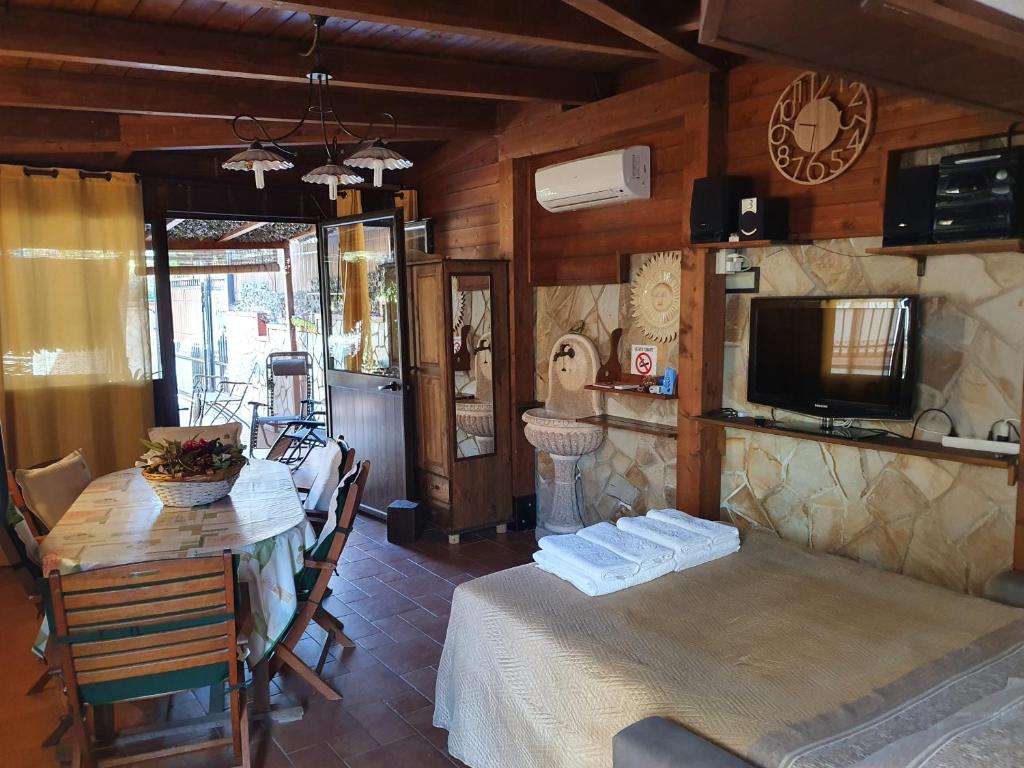 A television and/or entertainment centre at La Dependance delle Mimose