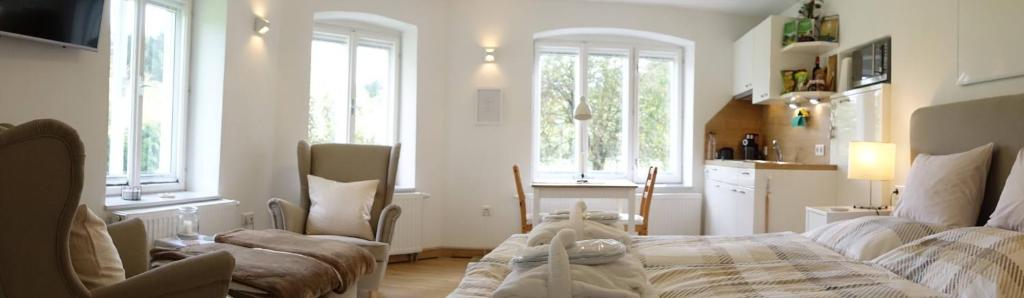 Posedenie v ubytovaní Grüne Wiese - Gäste-Minibungalow in der Edermühle