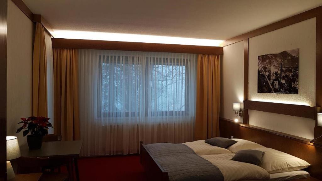 Letto o letti in una camera di Haus Kohl