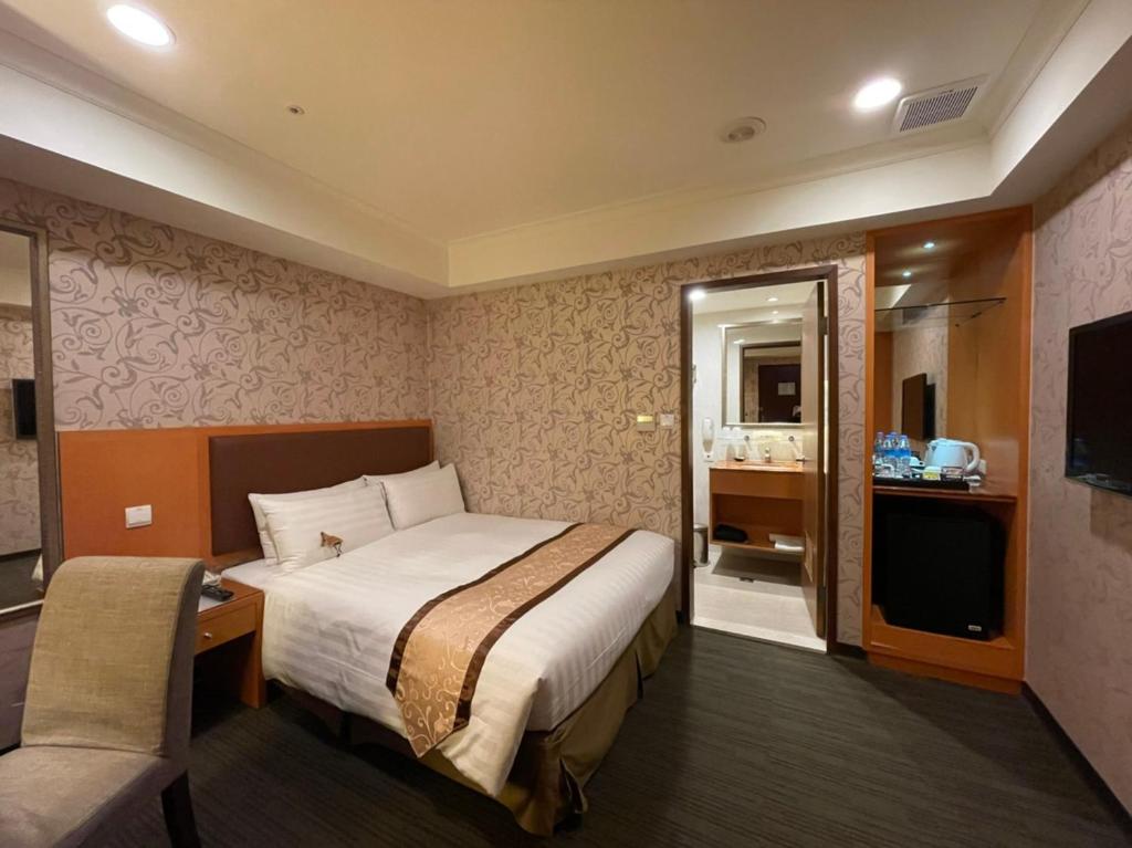 TV a/nebo společenská místnost v ubytování Fuward Hotel Tainan