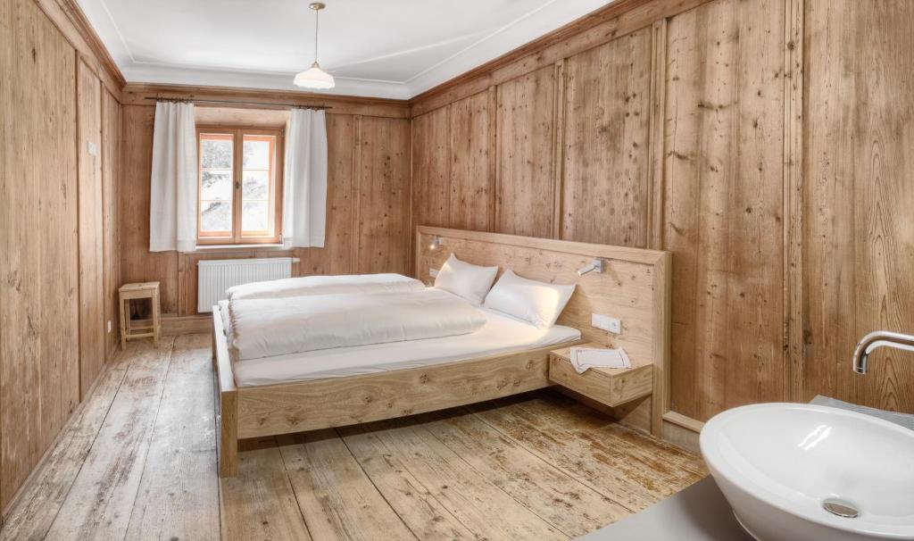 Postel nebo postele na pokoji v ubytování Exclusive Apartment Tassenbacherhof