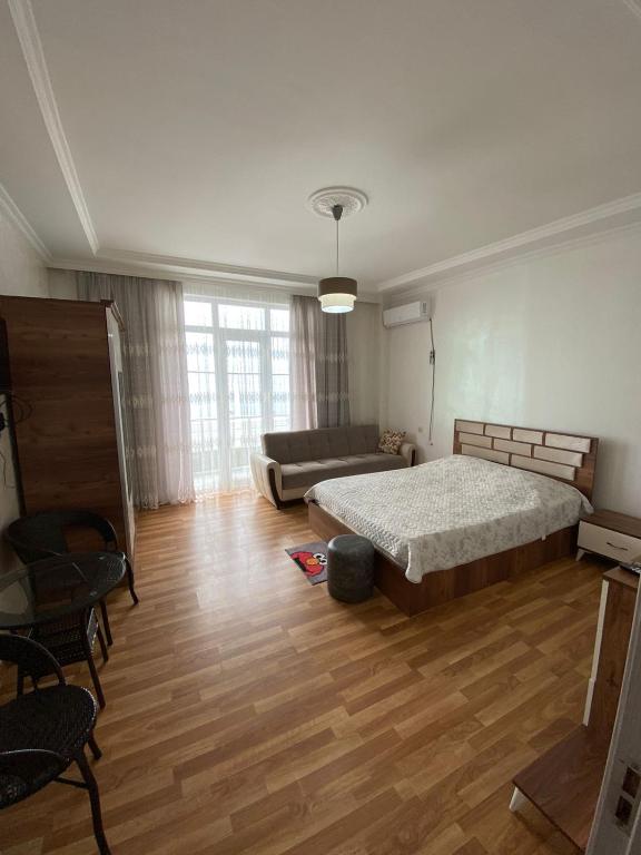Postel nebo postele na pokoji v ubytování SARPI HOTEL NUMA