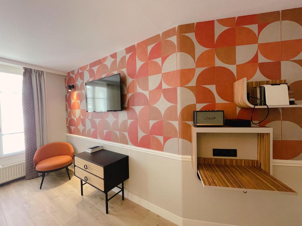 Кухня или мини-кухня в Hôtel de L'Esperance
