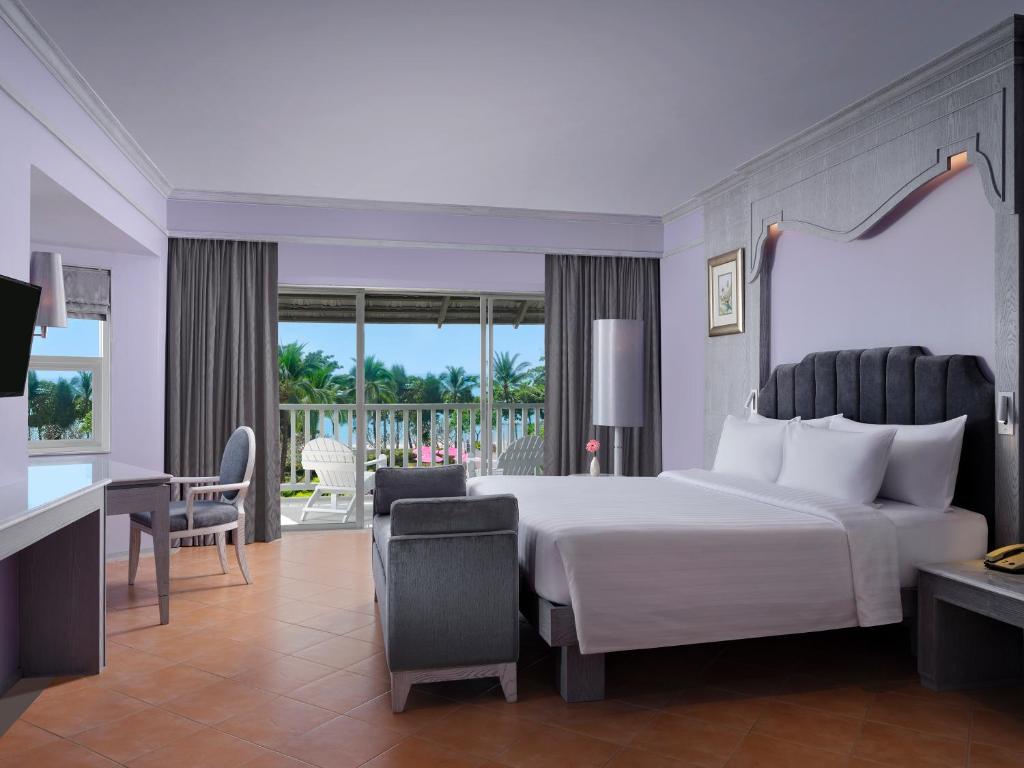 Кровать или кровати в номере Aonang Villa Resort I Beach Front