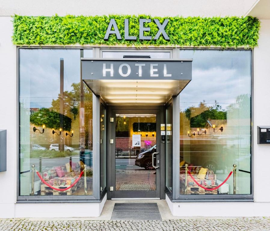 a hotel sign on the front of a building at Hotel Alex Berlin in Berlin