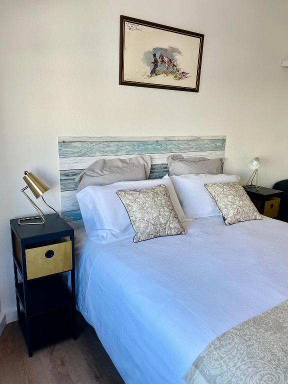 A bed or beds in a room at Home Triana