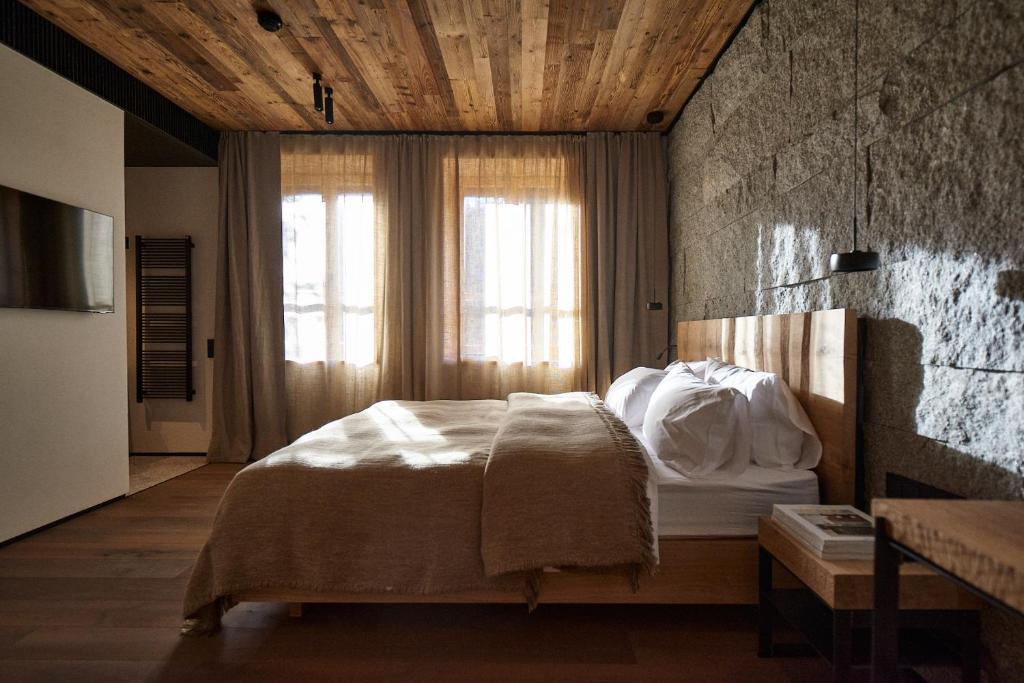 Postel nebo postele na pokoji v ubytování EnHotel