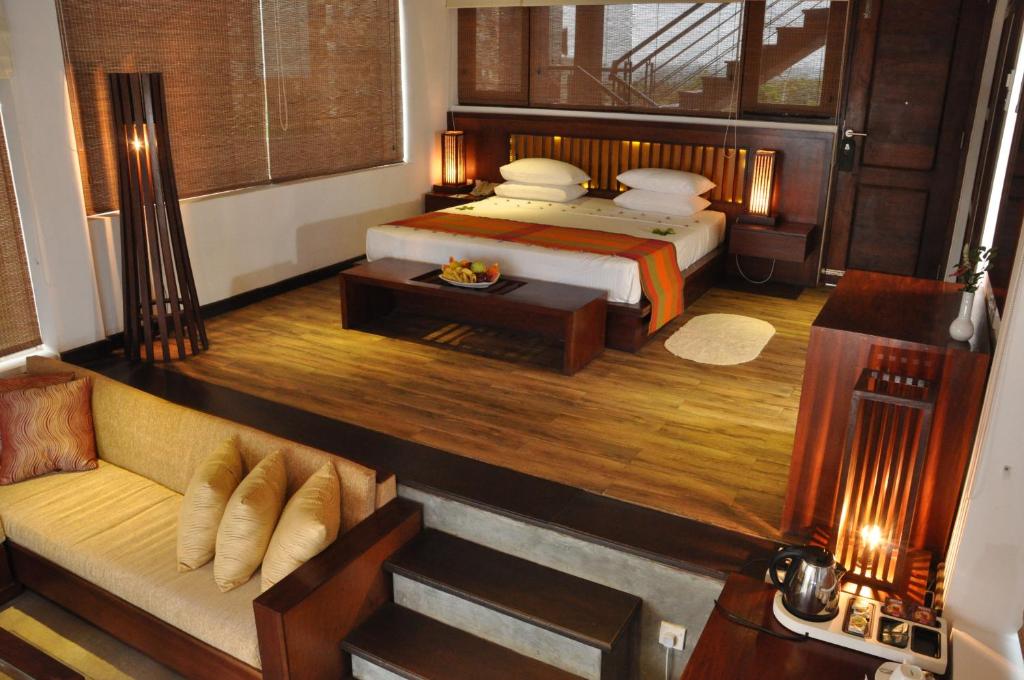 Postel nebo postele na pokoji v ubytování Laya Safari Resorts & Spa