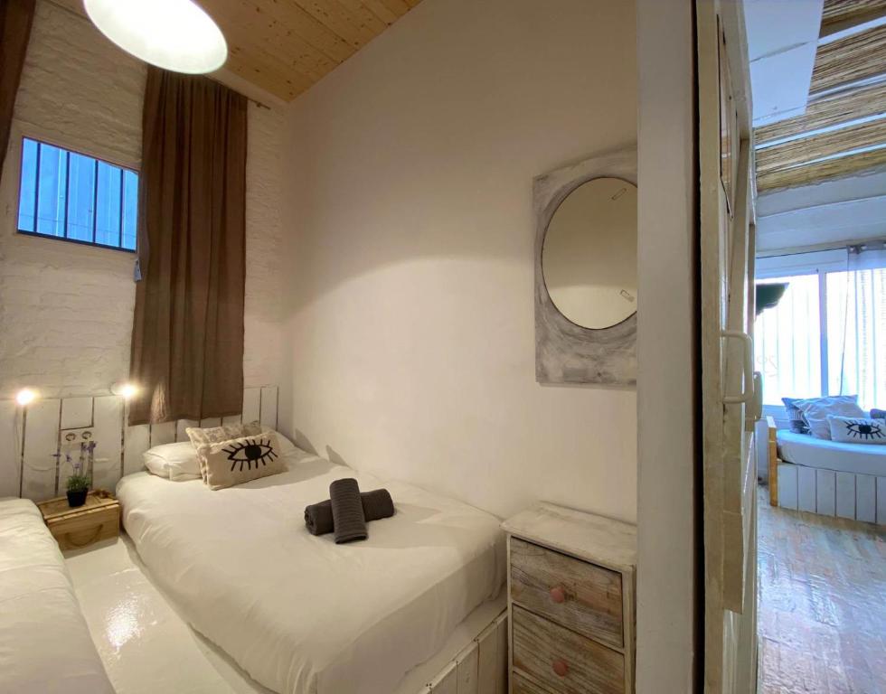 Posteľ alebo postele v izbe v ubytovaní Fridays Flats Casa Aquamarine