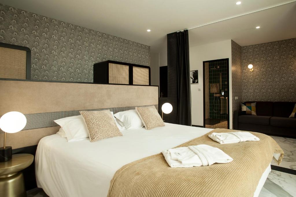 Postel nebo postele na pokoji v ubytování Hotel La Pietra Restaurant & Spa