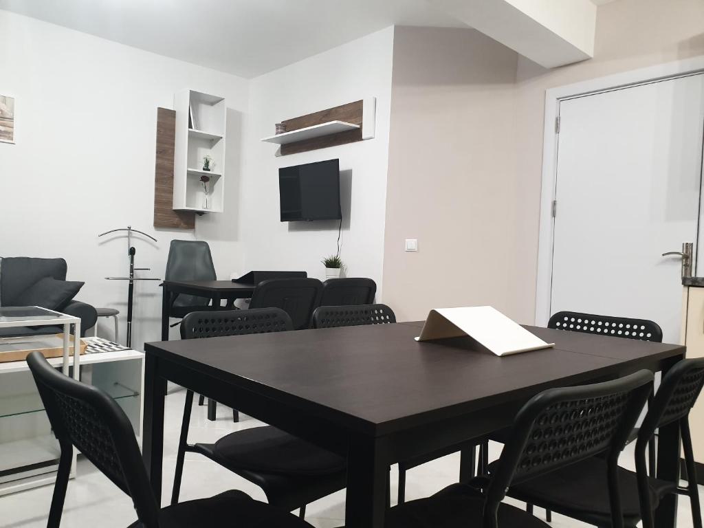 A television and/or entertainment centre at New The Twins Varna Two-Bedroom, Apt 5 at 15 Tsani Ginchev Street, floor 3