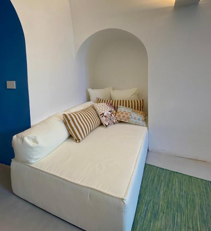Posteľ alebo postele v izbe v ubytovaní Casa Capri Mores