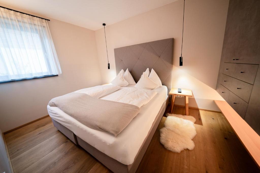 Posteľ alebo postele v izbe v ubytovaní Katschberg Lodge