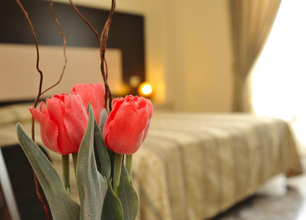 A bed or beds in a room at Hotel Gabbiano