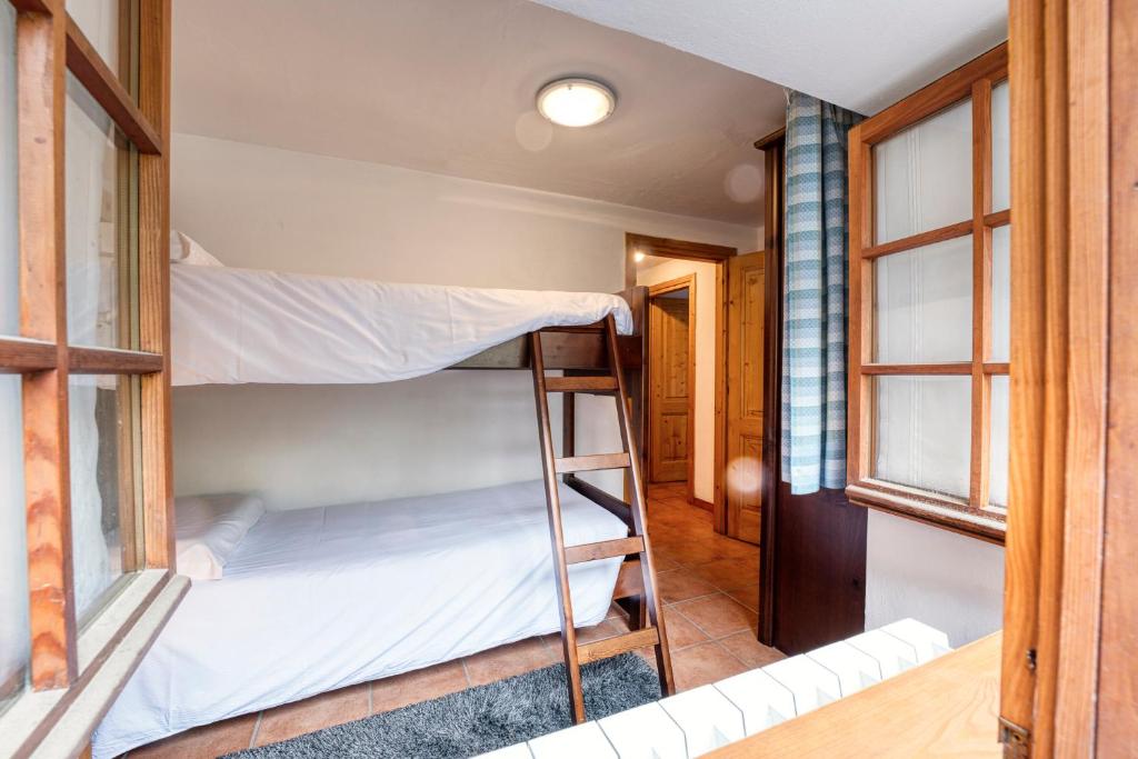 Posteľ alebo postele v izbe v ubytovaní Incanto Walser Apartments Ronco
