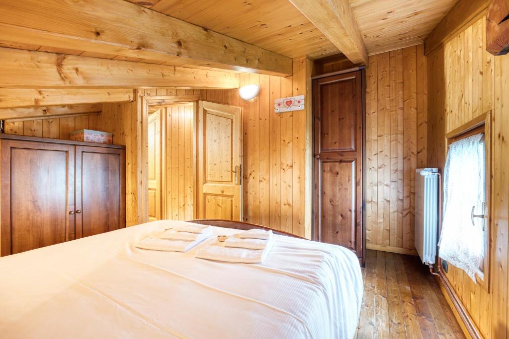 Posteľ alebo postele v izbe v ubytovaní Incanto Walser Apartments Ronco
