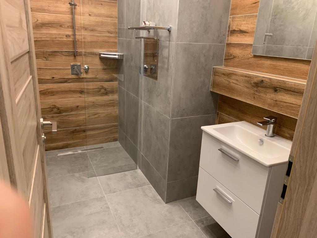 Koupelna v ubytování Apartmány na Plešivci