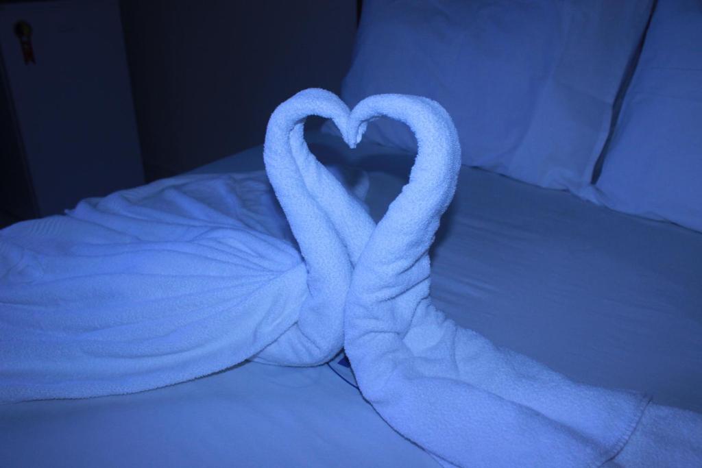 Postel nebo postele na pokoji v ubytování Hotel Rey