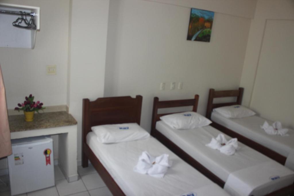 Postel nebo postele na pokoji v ubytování Hotel Rey