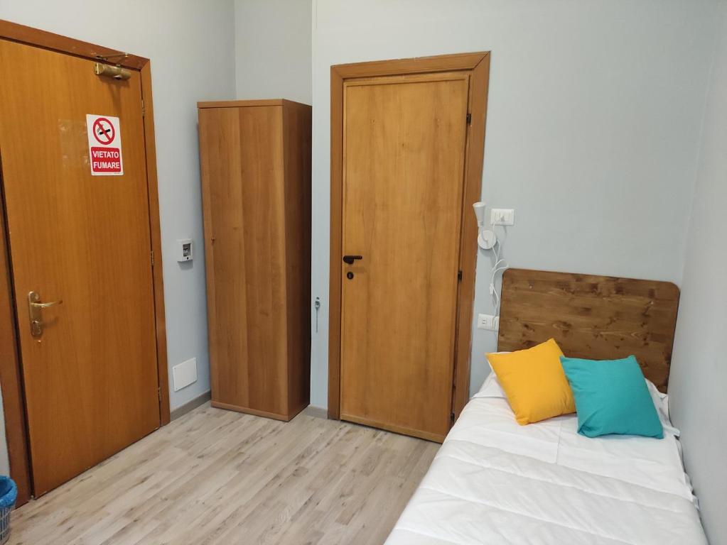 Postel nebo postele na pokoji v ubytování Hotel Big Bang