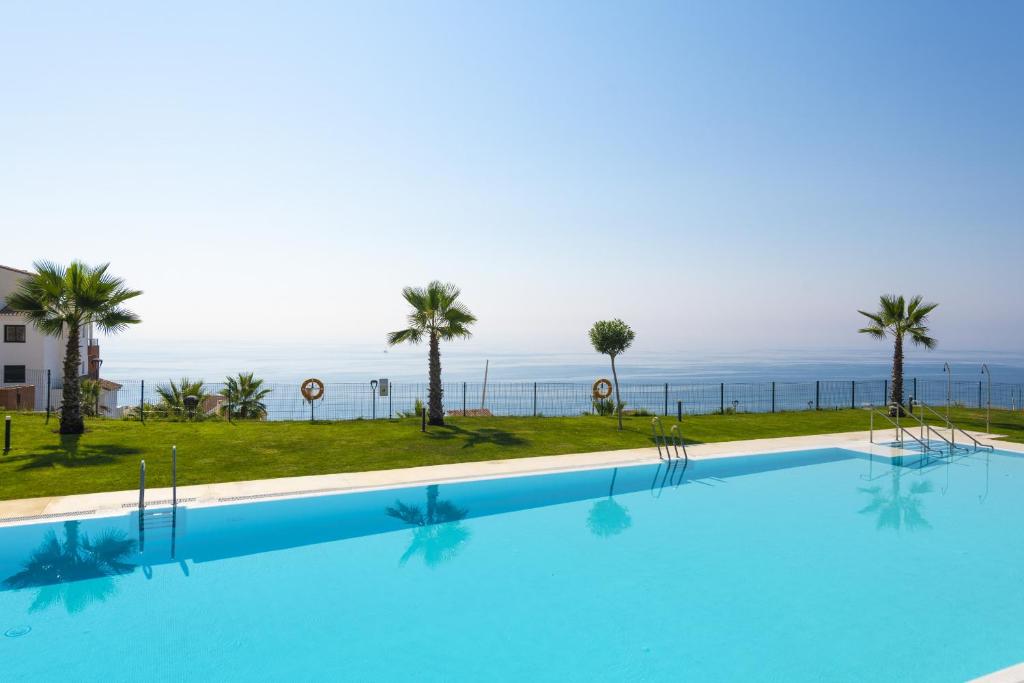 Basen w obiekcie Apartamento de lujo con jardin privado lub w pobliżu