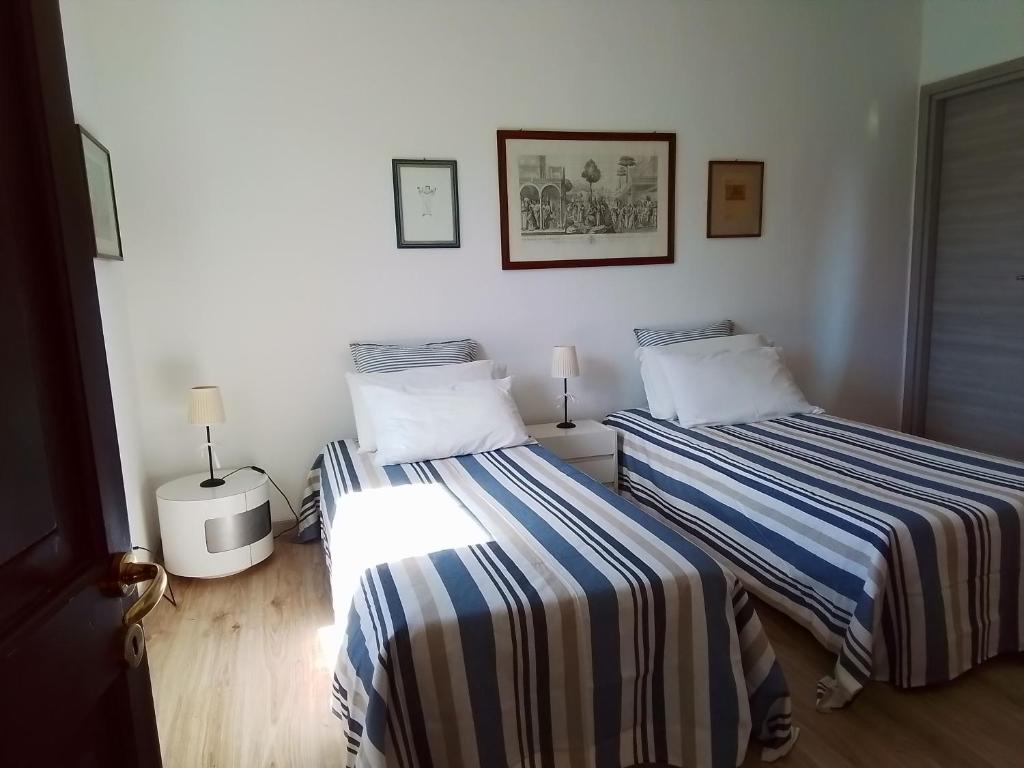 Postel nebo postele na pokoji v ubytování ANITA B&B