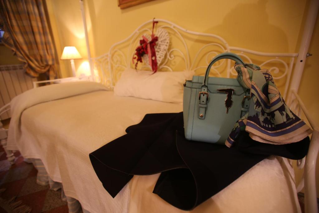 Posteľ alebo postele v izbe v ubytovaní B&B Le Aquile