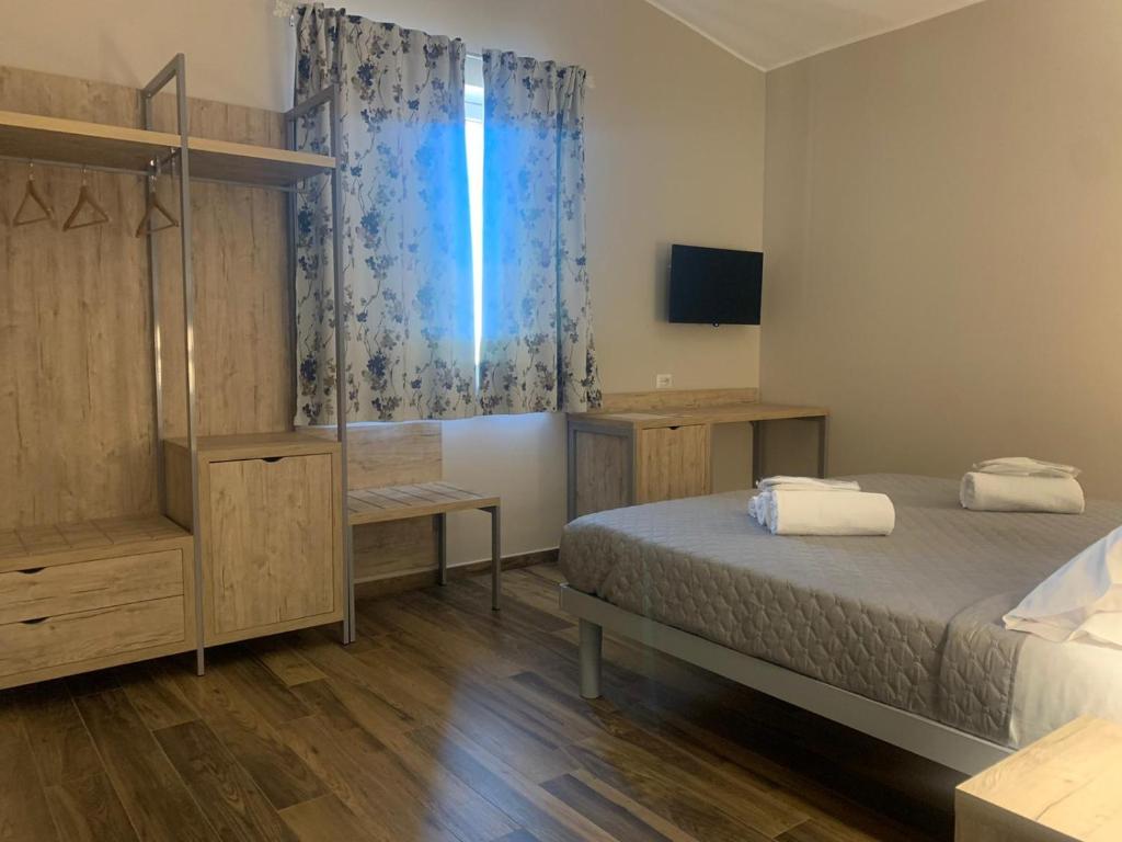 Postel nebo postele na pokoji v ubytování Masseria Spinale Wine Resort