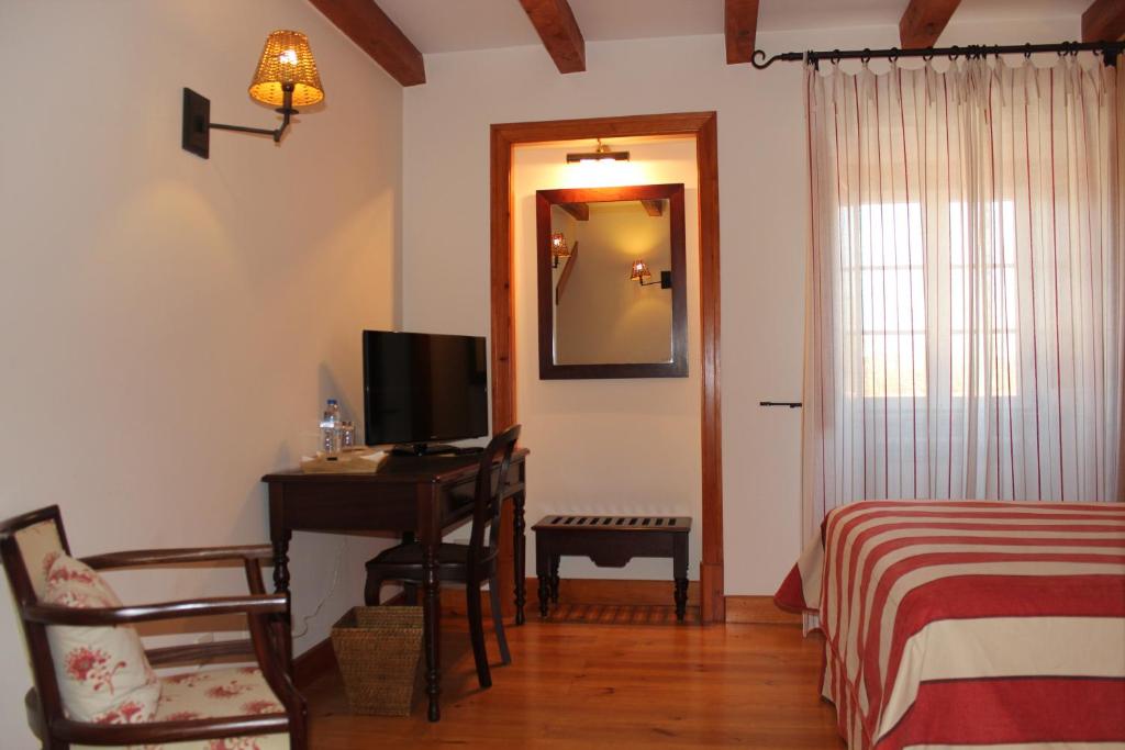 TV a/nebo společenská místnost v ubytování Casa de Campo Sao Rafael - Turismo Rural