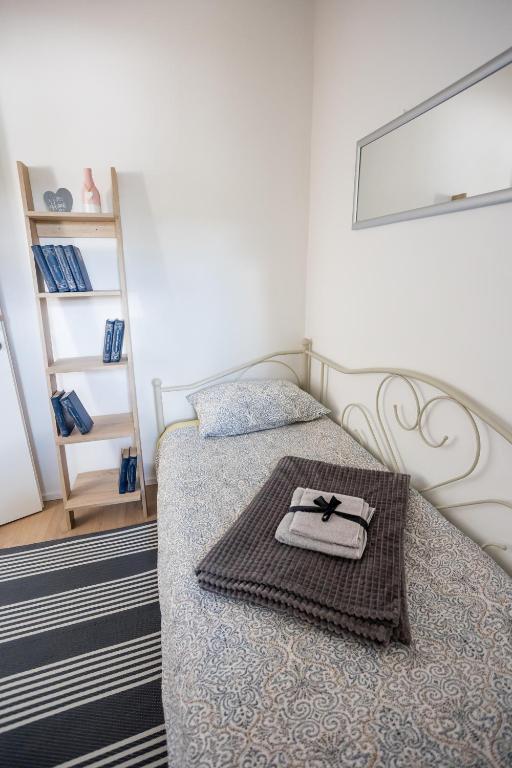 Posteľ alebo postele v izbe v ubytovaní Apartman "Stay In" Osijek