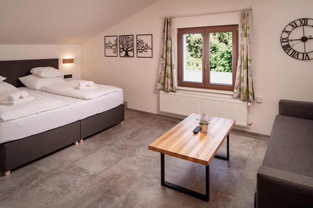 Postel nebo postele na pokoji v ubytování Wellness aparthotel Martiňák