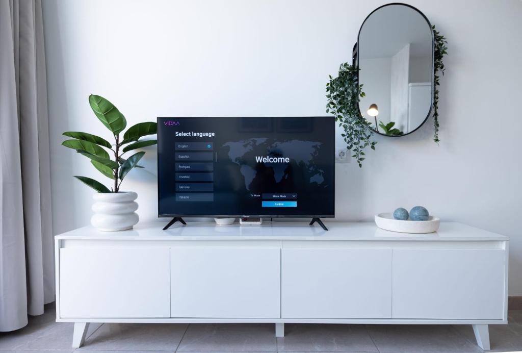TV a/nebo společenská místnost v ubytování Mar Azul Fuerteventura