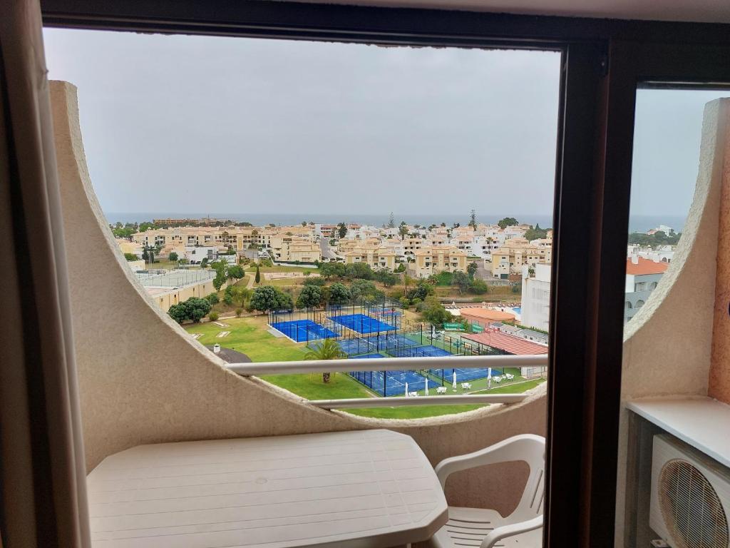 a view from the window of a room with a view of a stadium at Albufeira Paradise in Albufeira