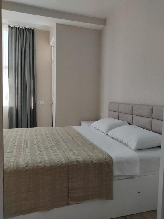 Postel nebo postele na pokoji v ubytování Pushkin street Pearl