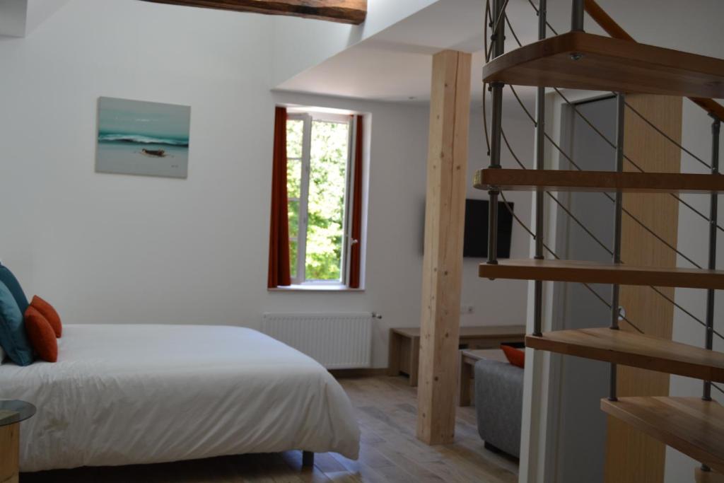 Postel nebo postele na pokoji v ubytování Lebeau Repos
