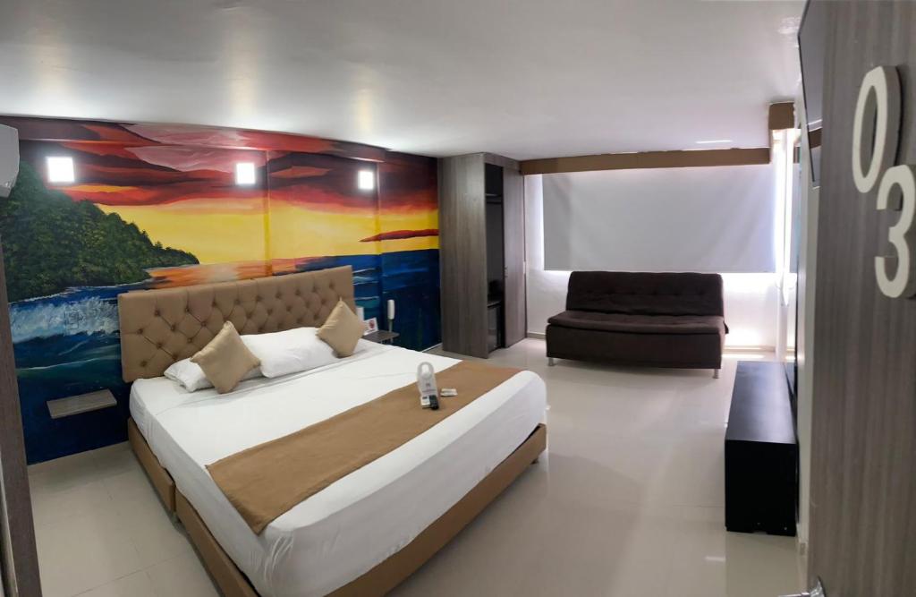 Postel nebo postele na pokoji v ubytování Hotel Hernández CTG