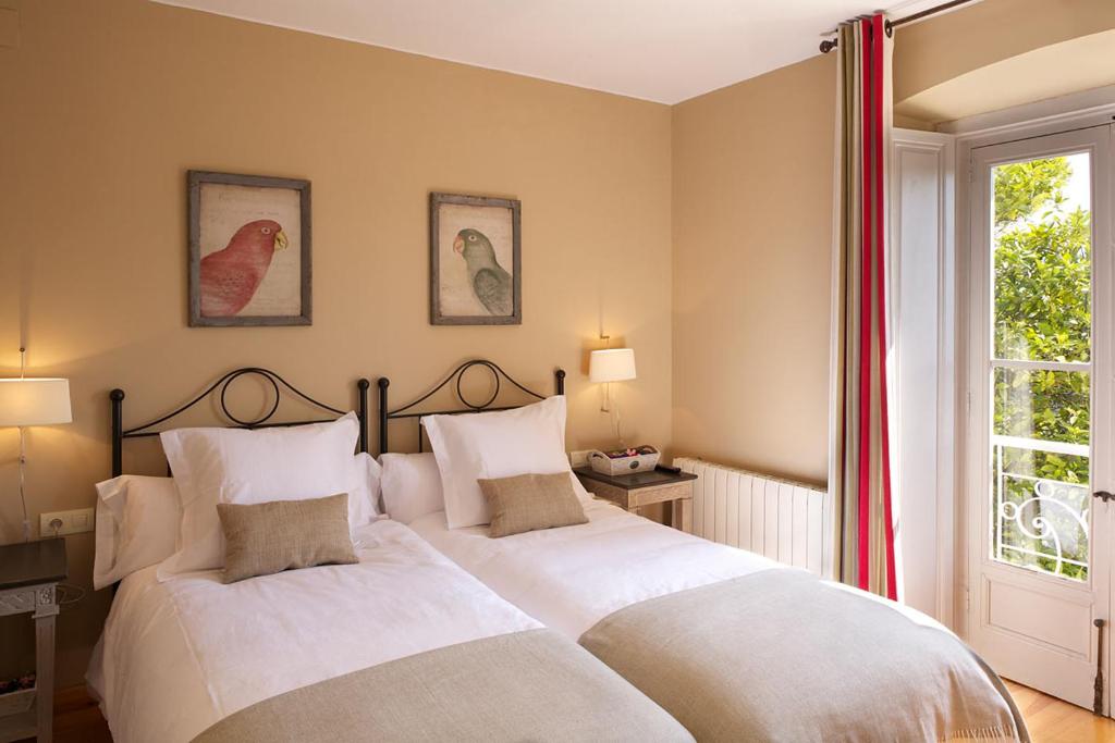 A bed or beds in a room at CASONA QUINTA HERMINIA