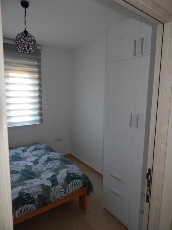 Apartman Zvezda vodilja房間的床