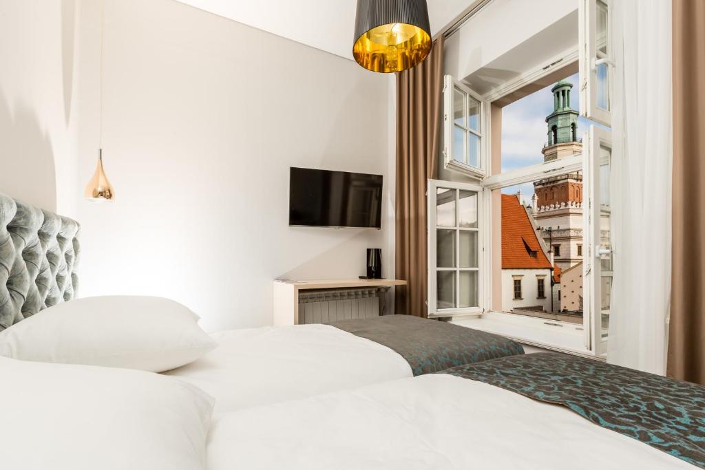 Posteľ alebo postele v izbe v ubytovaní Sleep in Hostel & Apartments Stary Rynek