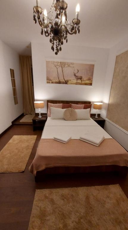 Postel nebo postele na pokoji v ubytování Ambiennt