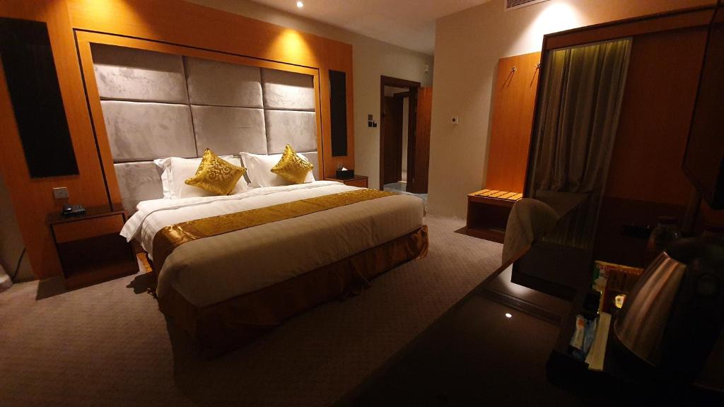 Letto o letti in una camera di Al Rayyan Tower