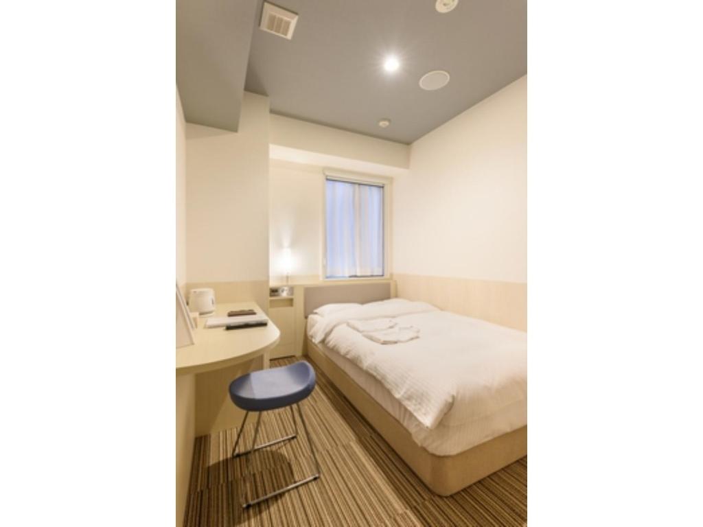Ліжко або ліжка в номері Belken Hotel Kanda - Vacation STAY 80875v