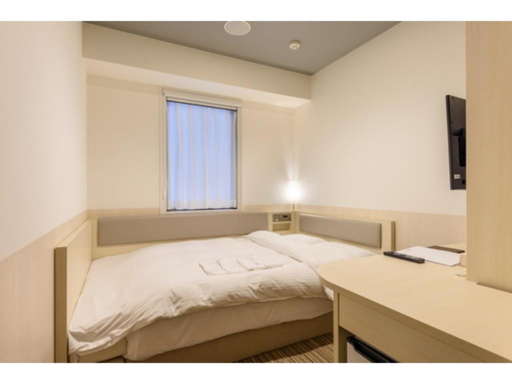 Кровать или кровати в номере Belken Hotel Kanda - Vacation STAY 80884v