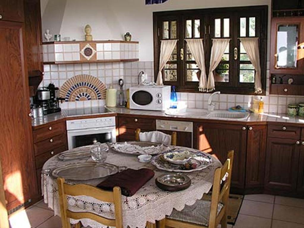Kuchyň nebo kuchyňský kout v ubytování Archontariki Guesthouse