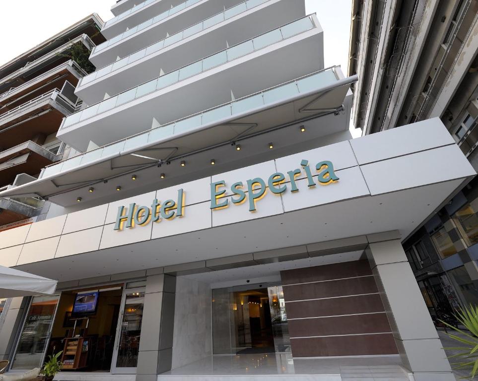 a hotel egoica sign on the front of a building at Esperia Hotel in Kavala