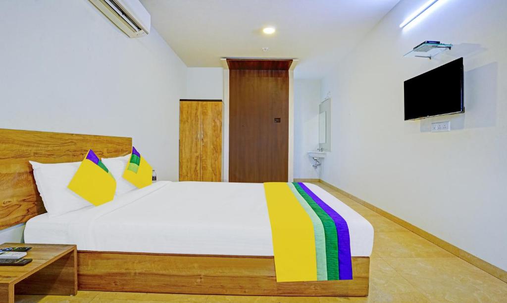 TV a/nebo společenská místnost v ubytování Itsy Hotels Oasis Pride