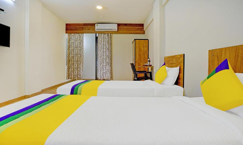 Postel nebo postele na pokoji v ubytování Itsy Hotels Oasis Pride
