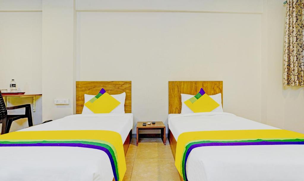 Postel nebo postele na pokoji v ubytování Itsy Hotels Oasis Pride