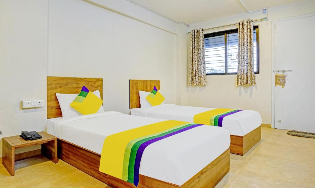 Postel nebo postele na pokoji v ubytování Itsy Hotels Oasis Pride