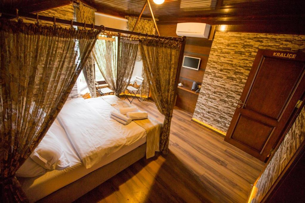 Postel nebo postele na pokoji v ubytování Mavisu Deluxe Butik Otel